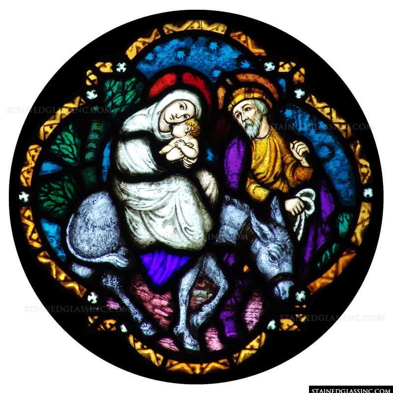 The Flight to Egypt is depicted in this stained glass rose window. 