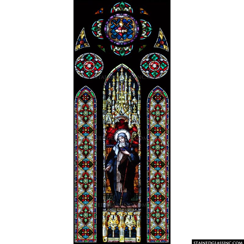 A Gothic stained glass image of Saint Gertrude. 