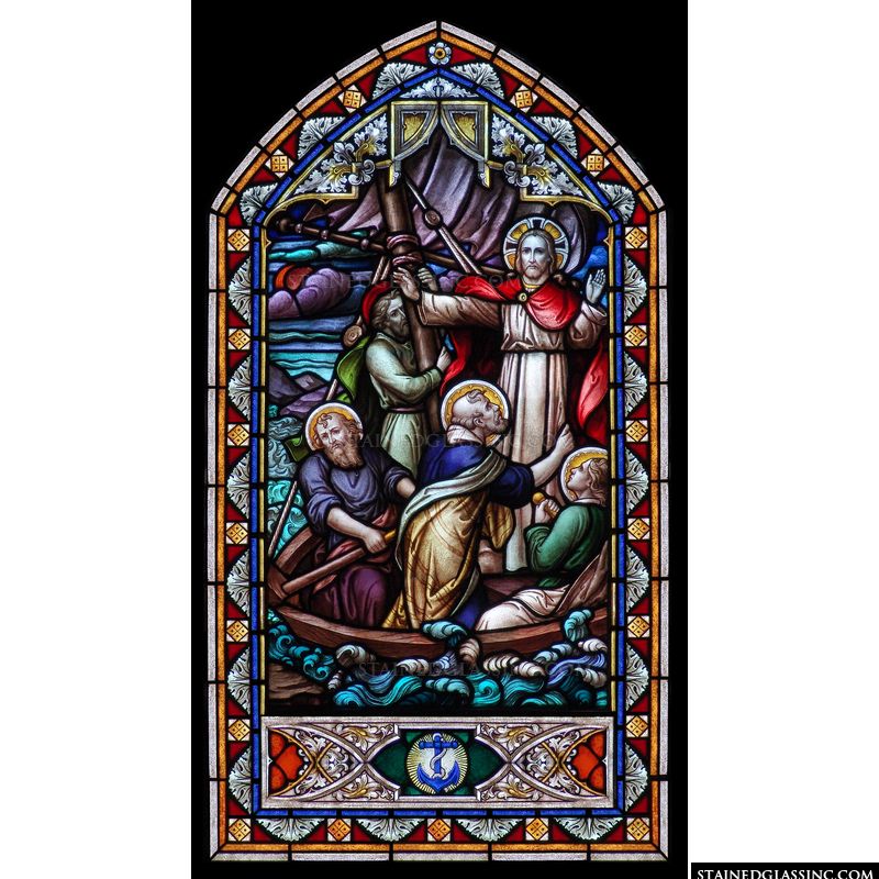 Jesus calms the stormy sea in this arched stained glass window panel. 