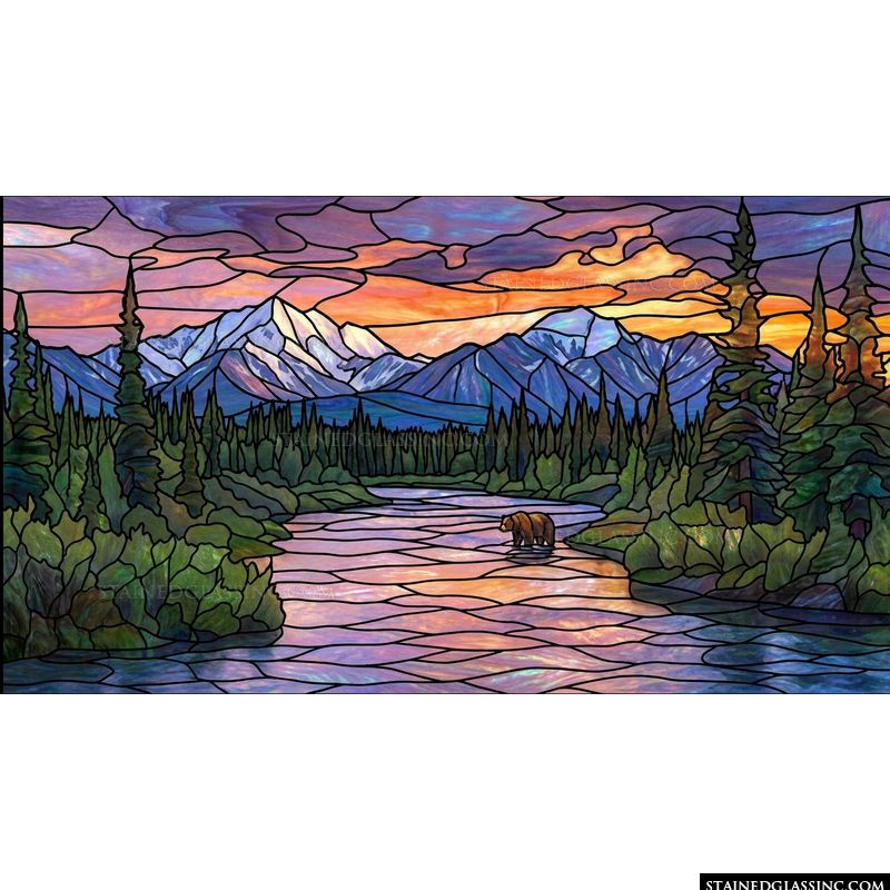 Grizzly Bear in Mountain River at Sunset