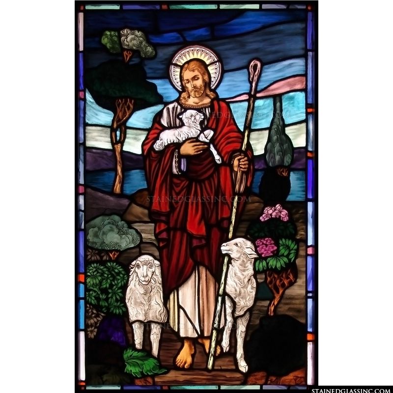 Jesus is depicted in this stained glass artwork as the Good Shepherd caring for His sheep. 