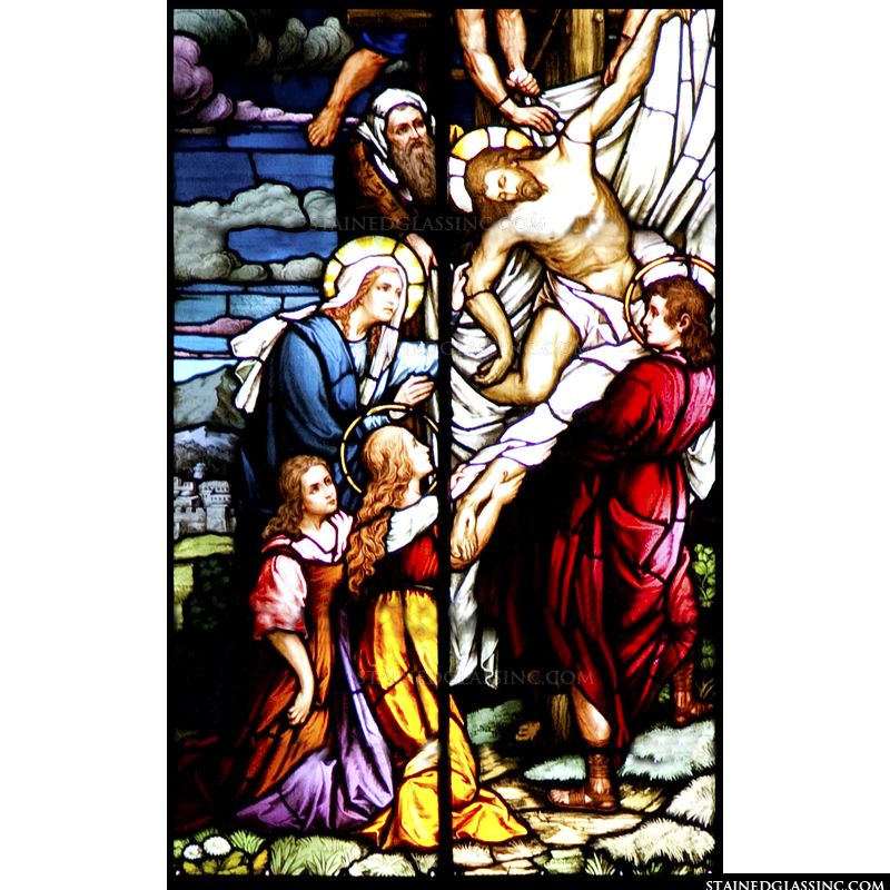This stained glass image depicts Christ's body being taken down from the cross. 