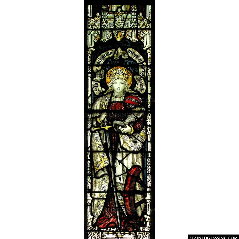 A beautiful stained glass window featuring Saint Catherine of Alexandria. 