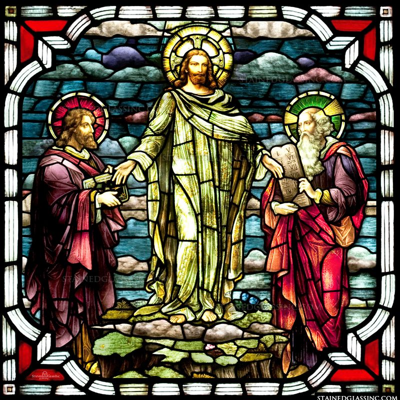 Christ is pictured with Moses and Elijah on the Mount of Transfiguration in this stained glass artwork. 