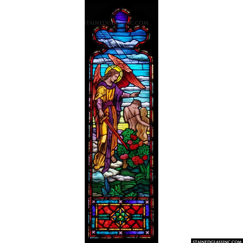 A stained glass image of Adam and Eve. 