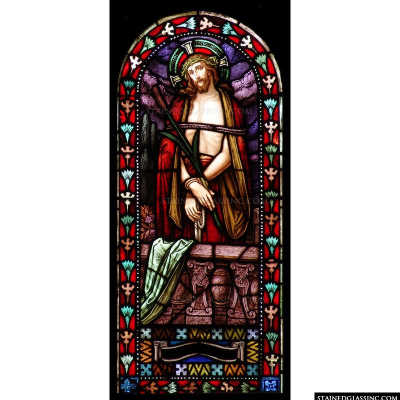 Jesus is pictured wearing the crown of thorns while tied up and bound in this stained glass image. 