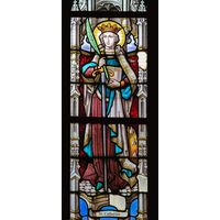 Saint Catherine: The Scholar and Martyr in Stained Glass