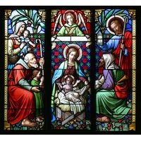 The Adoration of the Shepherds: A Sacred Nativity Scene in Stained Glass