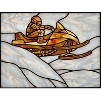 Snowmobiler in Motion