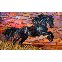 Leaping Stallion Against Sunset Sky