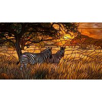 Zebras on the African Savanna at Sunset