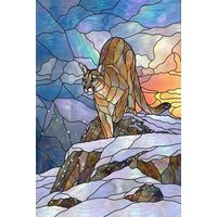 Mountain Cougar in Winter Sunset