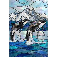 Orcas Breaching Near Snow-Capped Mountains