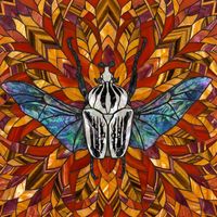 Iridescent Beetle in Amber and Autumn Hues