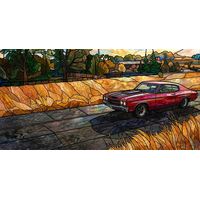 Classic Red Muscle Car at Sunset