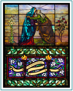 A stained glass image of the Visitation between Mary and Elizabeth makes a great stained glass memorial. Display memorials in stained glass in your church or home.